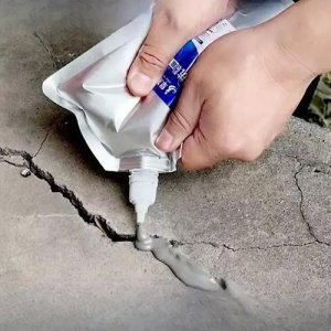 Cementitious crack repair