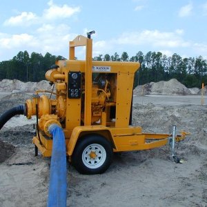 Self-priming trash pumps